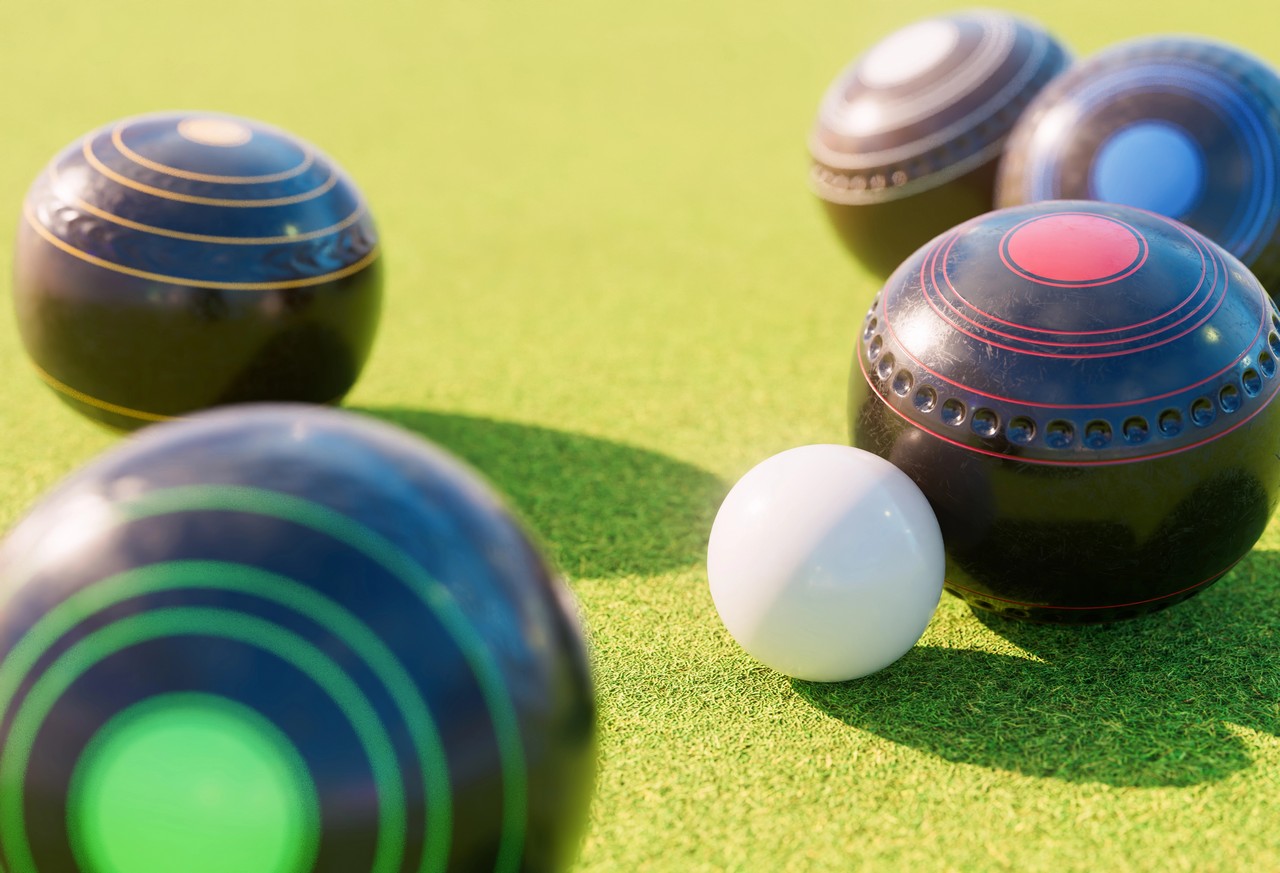 Coloured lawn bowls and jack on the green at Palmwoods Community Club