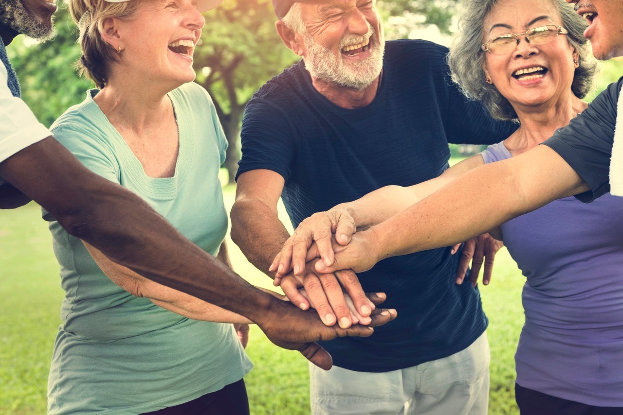 Friends raising a glass together as Palmwoods Community Club members